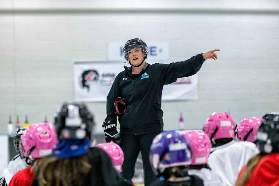 Kaylee Grant goes through a drill with some young players during an on-ice session on Saturday. Photo courtesy of Thorsten Gohl 