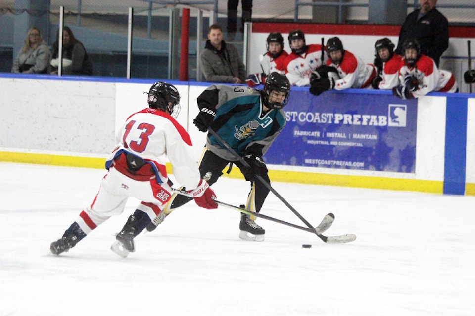 Cowichan Valley C2’s Owen Watson attempts to check Port Hardy’s Keadan Coburn at the blueline. (Photo by Don Bodger) 