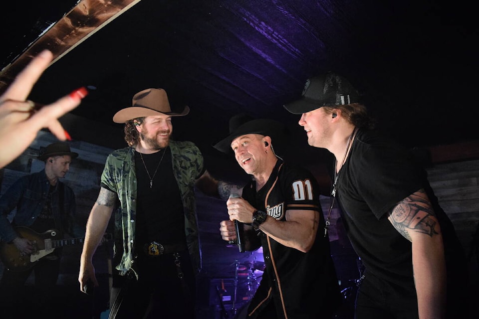 Matt Lang (left), Aaron Pritchette (middle), and Cory Marks took over This Country Bar in Kelowna on Feb. 15, 2024 for its first ever event. The concert sold out. (Brittany Webster/Capital News) 
