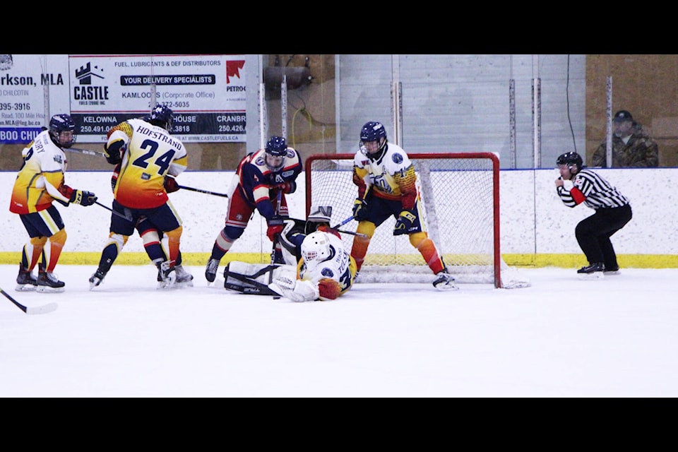 100 Mile House Wrangler goalie Ivan Tolsma scrambles to save the puck during the Wrangler’s final game against the Kamloops Storm. (Patrick Davies photo - 100 Mile Free Press) 