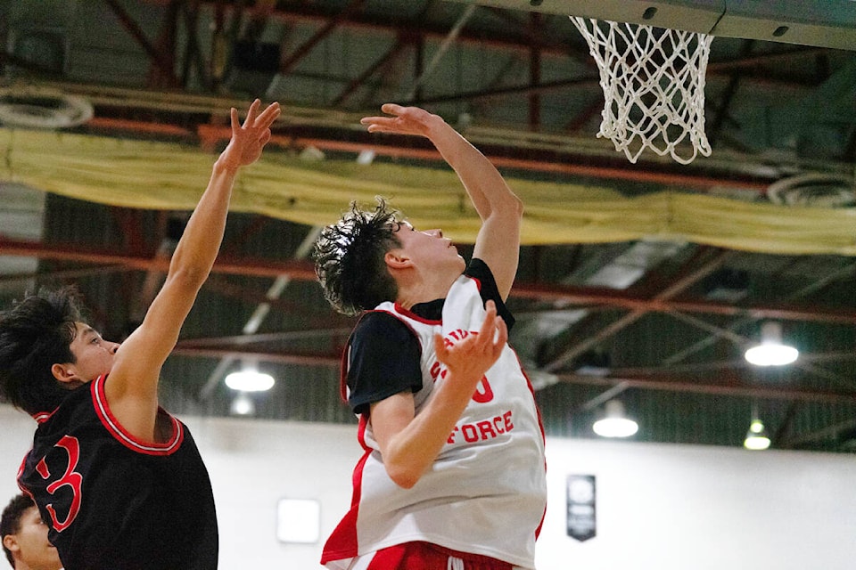 Intermediate - Skidegate in white versus Massett in black. (Kara Wilson/Kids4Cameras, special to the Northern View) 