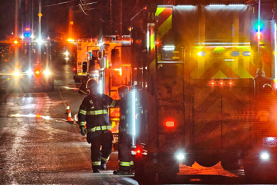 Multiple fire trucks were called to the scene of a house fire on 240th Street near 61st Avenue Sunday, Feb. 25. (Dan Ferguson/91ԭ Advance Times) 