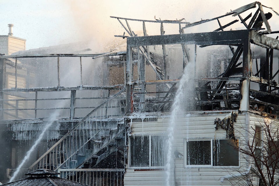 An early morning fire gutted a home in the 300-block of McGillivray Place in New Westminster on Tuesday, Feb. 27, 2024. (Credit: Shane MacKichan) 