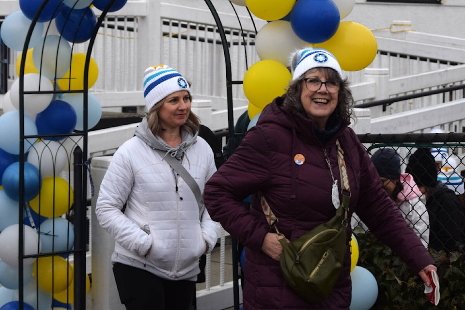 Walkers depart from Char’s Landing in Port Alberni for the annual Coldest Night of the Year walk. (ELENA RARDON / Alberni Valley News) 