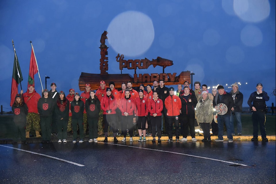 The Wounded Warrior Run stops for a photo by the Port Hardy signage early Sunday morning. (John Tidbury Facebook photo) 
