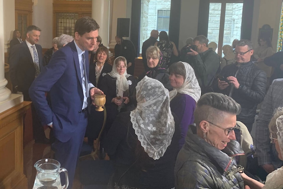 B.C. Premier David Eby talks with people who came to hear his apology to the Sons of Freedom Doukhobors in the Provincial Legislature on Feb. 27. Photo: Wolfgang Depner 