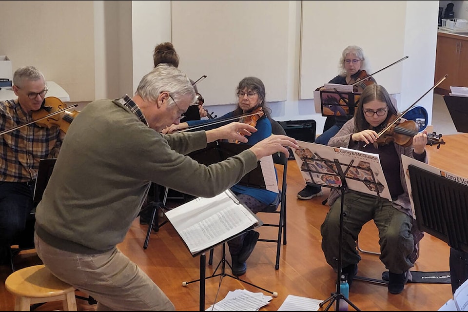 Chris Redsell directs the Cowichan Camerata String Orchestra in their upcoming show on March 10, 2024. (Submitted photo) 