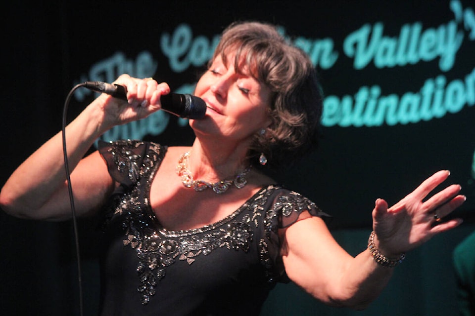 Edie Daponte fills the room with love for her show in Crofton Sunday. (Photo by Don Bodger) 