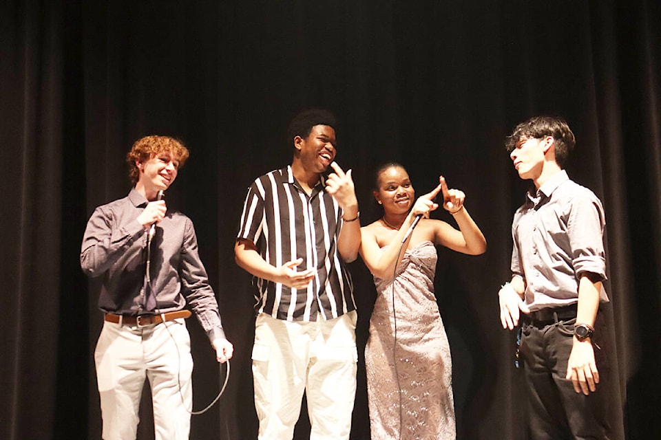 The emcees for “Tweedy’s Got Talent” entertain the audience during the show Feb. 22. From left: Riley Tinkl, Marvin Raymond, Moyosore Etta, and Josh Rix. (Photo submitted: Zandrea Cambronero) 