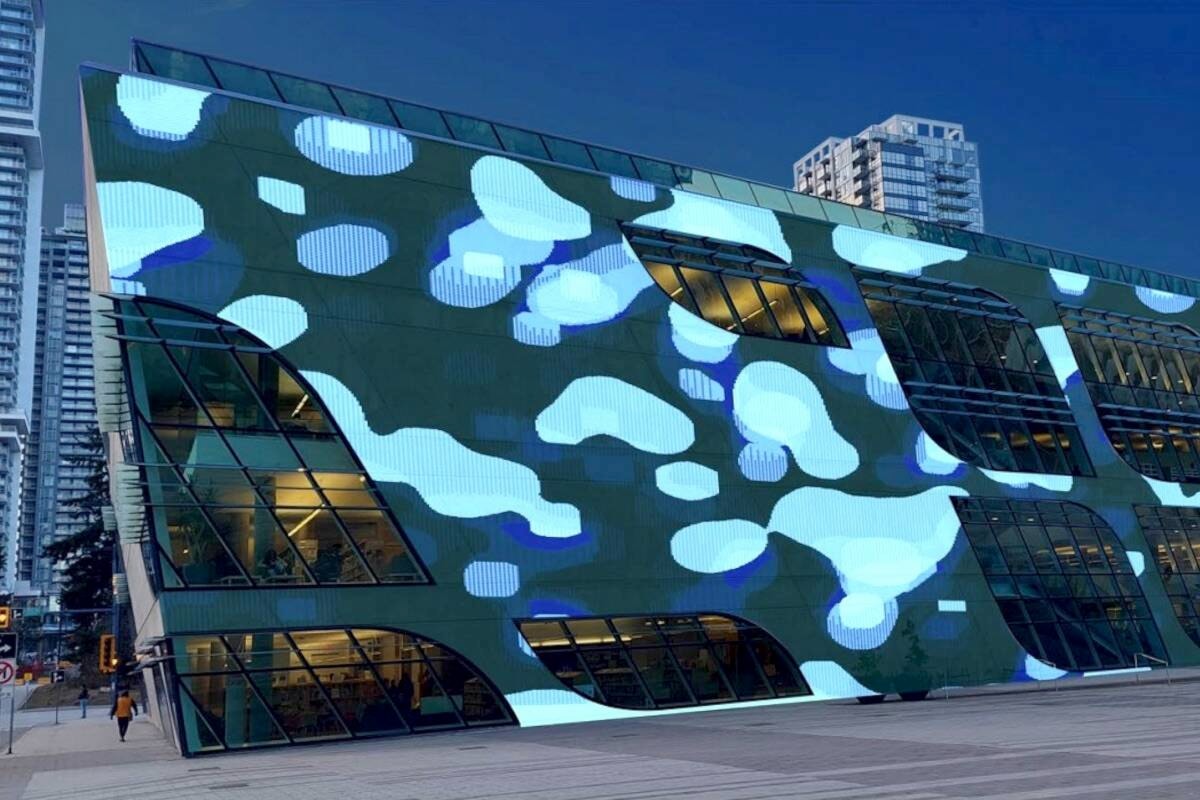 M work to set up Surrey’s UrbanScreen to display electronic artwork on library creating wall