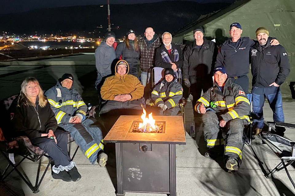 Mayor Surinderpal Rathor surprised the Williams Lake Fire Department with pizza on Feb. 23 as they prepared for their first of two nights sleeping on Canadian Tire’s rooftop, raising funds for muscular dystrophy. (Photo submitted) 