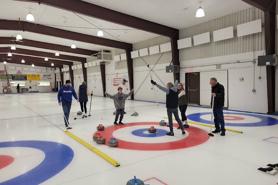 web1_rsz-nts-2-fennel-family-curling-celebrating-winning-shot