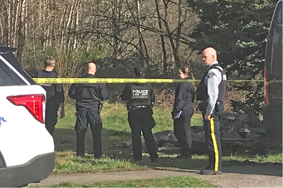 Police and IHIT at a Willoughby area site Tuesday, March 29, 2022, where Nicholas Ball was killed. (Langley Advance Times files) 