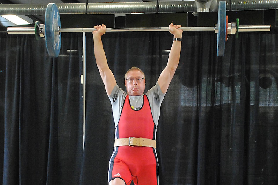 web1_230313-pqn-weightlifters-haul-medals-raykasten_1