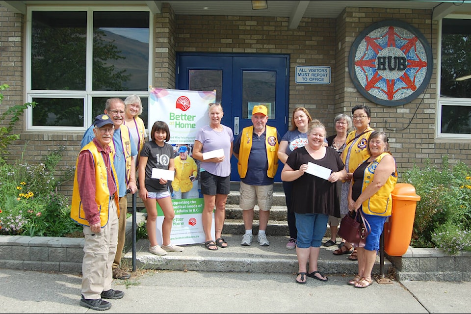 In August 2023, members of the Ashcroft and District Lions Club gathered at the Ashcroft HUB to present cheques to four local organizations, to assist them with their programs and work: Better at Home, the HUB, the South Cariboo Elizabeth Fry Society Food Bank, and South Cariboo Minor Soccer. The HUB is the recipient of a Canada’s Volunteer Award from the Government of Canada, in the category of ‘Social Innovator’. (Photo credit: Barbara Roden) 