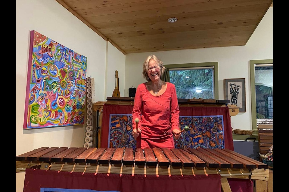 CSAG president Jennie Stevens plays the marimba in her Shawnigan Lake Woodruff music studio where she mentors youth in the art and expression of percussion with instruments such as this, and the xylophone. (Chadd Cawson/Connector) 