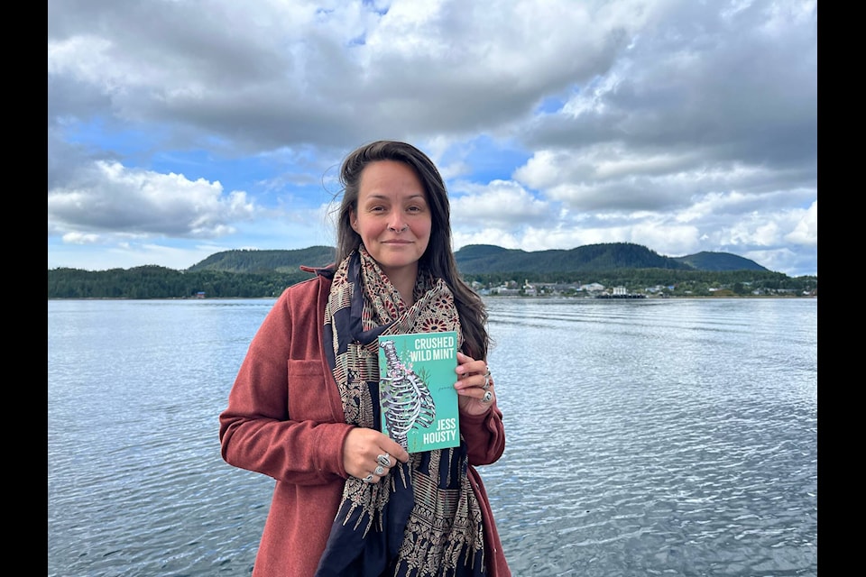 Author Jess Housty and her new book of poetry Crushed Wild Mint. Photo courtesy Jess Housty 
