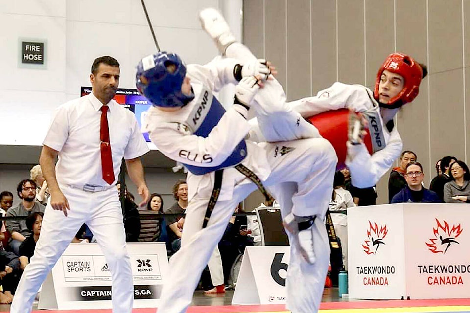 Cascadia Martial Arts Parksville athlete Matteo Bennet throws a high kick against his rival and goes on to win a gold medal at the BC Open Taekwondo Championships. (Contributed photo) 