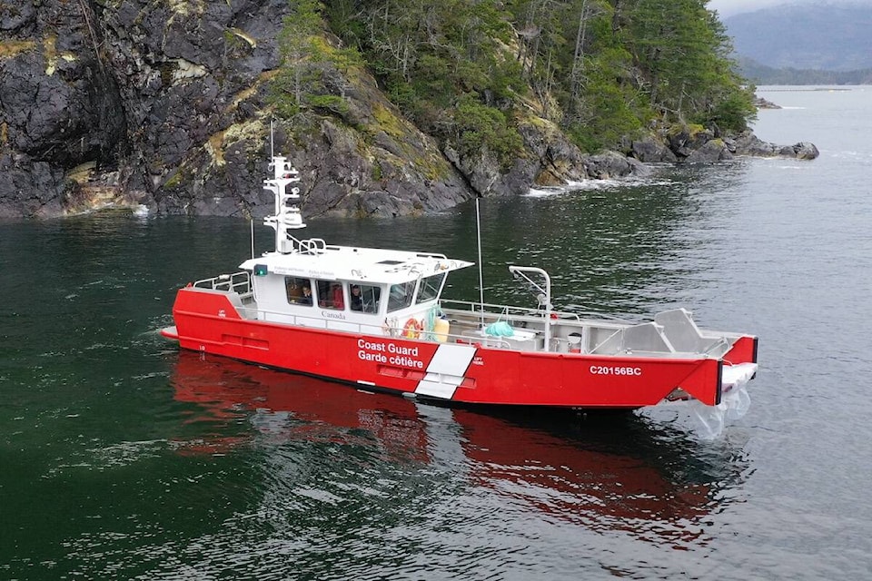 A Coast Guard pollution response vessel geared up to deal with leaking fluids from derelict boats. (Photo courtesy of the Canadian Coast Guard) 