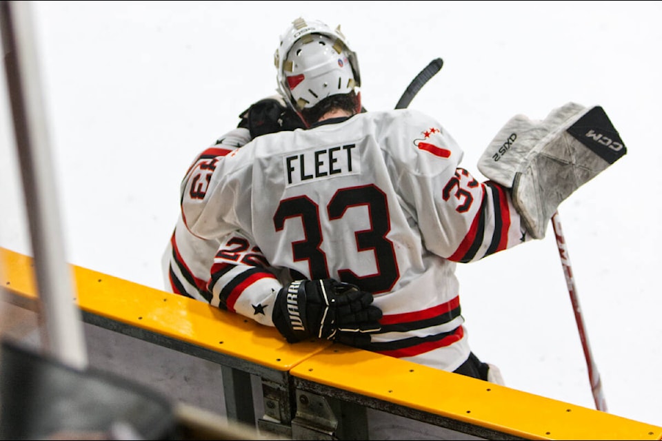 Matt Fleet and Jake Watson console each other after the loss. Paul Rodgers photo. 