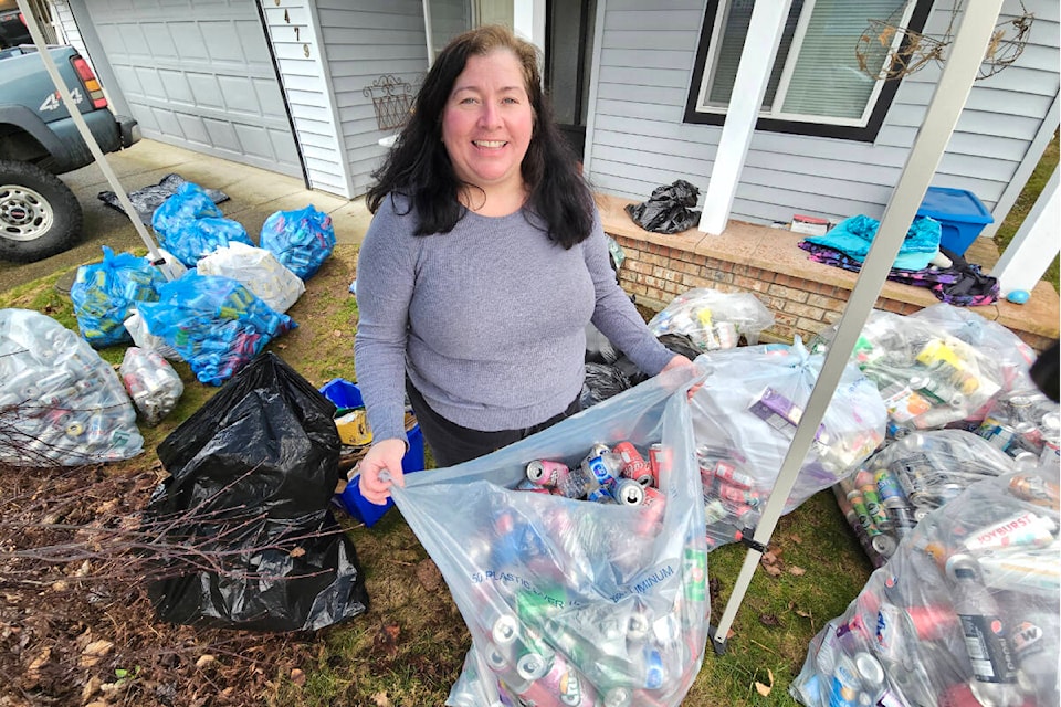The front yard of Ottergrove Girl Guides district commissioner Tara McIntyre’s Aldergrove home was filling up with donations for their bottle drive fundraiser on Saturday, March 2. (Dan Ferguson/) 