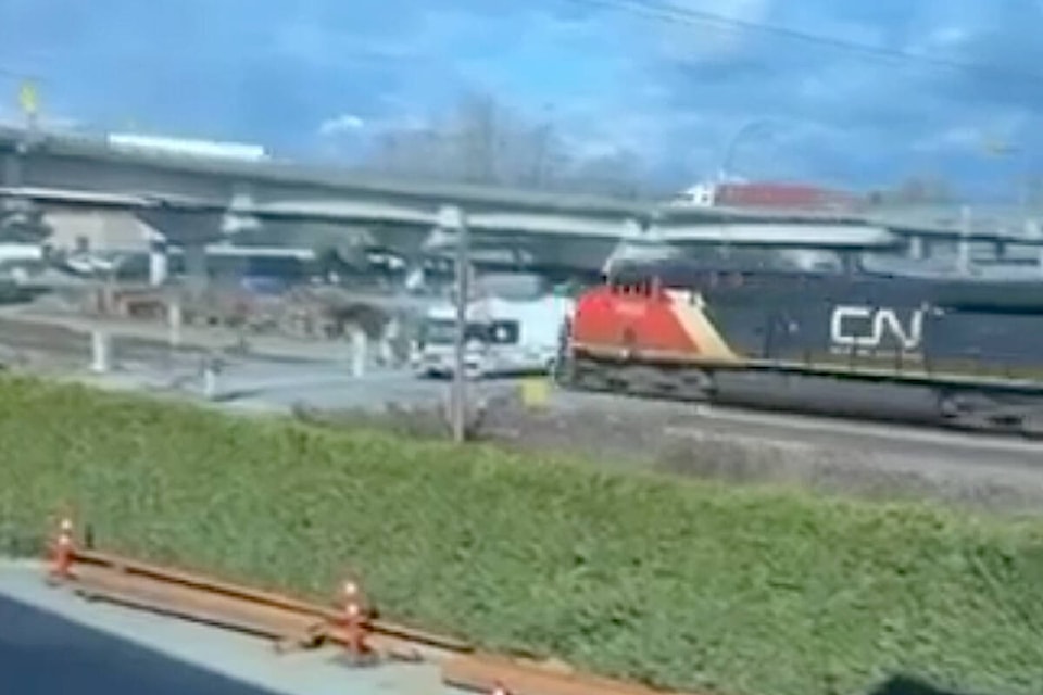 A video caught the moment when an RV, stopped on the railway tracks in Langley, was smashed by an oncoming CN Rail train on Tuesday, March 5. No one was injured. (JJ Kennard/Special to Langley Advance Times) 
