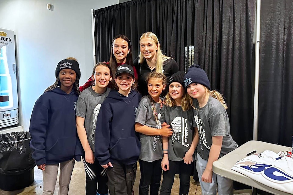 Young Silverhawks got to meet Hockey Canada’s U18 women’s national team players Chloe Primerano, back left, and Gracie Graham during the Shuswap Female Winter Tournament held in Salmon Arm over Family Day Weekend Feb. 17-19. (SAMHA photo) 