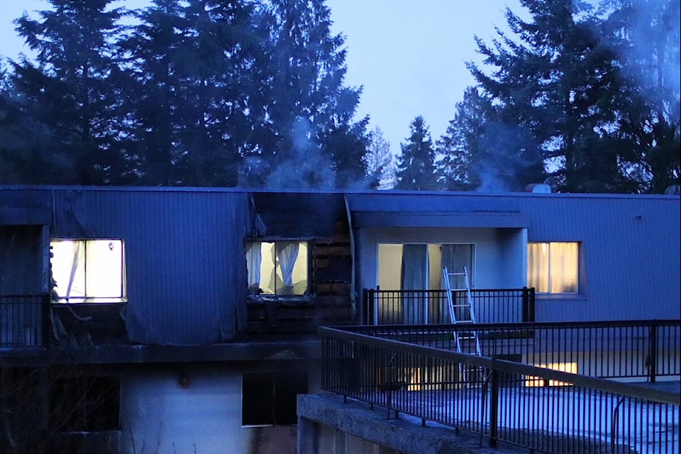 A fire early on Thursday morning (March 7) at a Coquitlam apartment building in the 500-block of Gatensbury Street displaced 100 people. (Credit: Shane MacKichan ) 