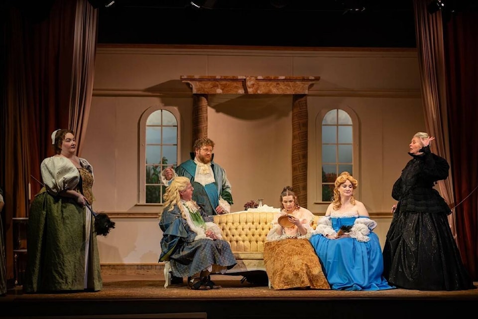 The Mercury Players’ production of ‘Tartuffe’ had its opening night at Duncan United Church on Feb. 29 and had audience members nearly rolling in the aisles. Dorine (Julia Lalonde), left, pretends to clean while eavesdropping on some family dynamics. Cleante (Dan Leckey), Damis (Will Johnson), Mariane (Sarah Chapeskie), Elmire (Sarah Knight) and Mme. Pernelle (Chris Johnson) discuss Tartuffe in the front room of Orgon’s home. (Photo by Ryan Whyte) 