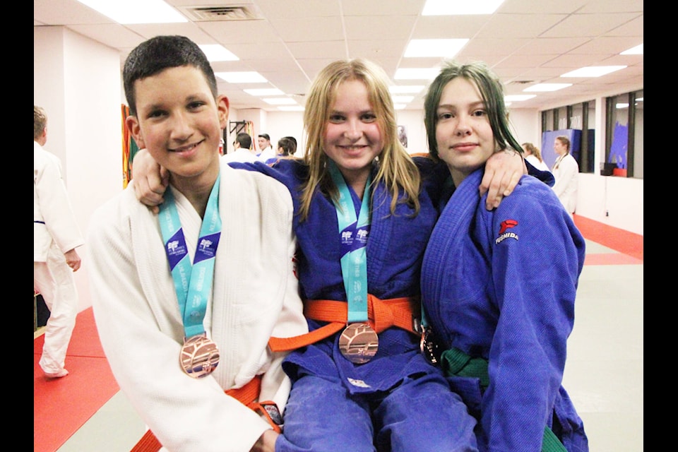 Nabil Louraid, (left), Diana Kozakova and Myah Mason all won bronze in Quesnel last weekend at the B.C. Winter Games. (Patrick Davies photo - 100 Mile Free Press) 