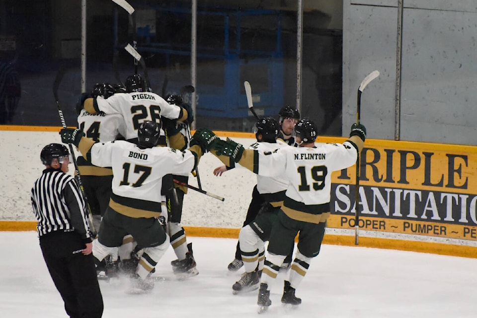 The Williams Lake Stampeders celebrate an overtime victory over the Quesnel Kangaroos to win the CIHL East Division playoffs March 2. The final score was 6-5 for the Stamps, with 58 shots on goal for Williams Lake and 32 shots on goal for Quesnel. (Angie Mindus photos/Williams Lake Tribune) 