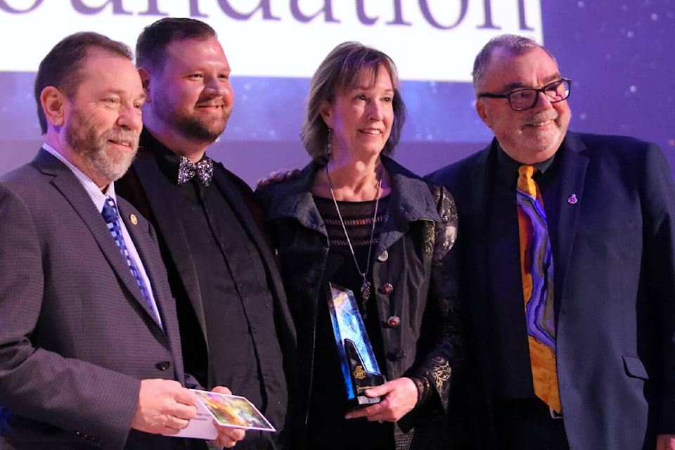 Maple Ridge Community Foundation president Kevin Nosworthy (left), treasurer Kathi Halpin (centre-right), and board member Ernie Daykin (right) accepted the Non-Profit of the Year Award at the 2024 Business Excellence Awards gala on March 9. (Brandon Tucker/The News) 