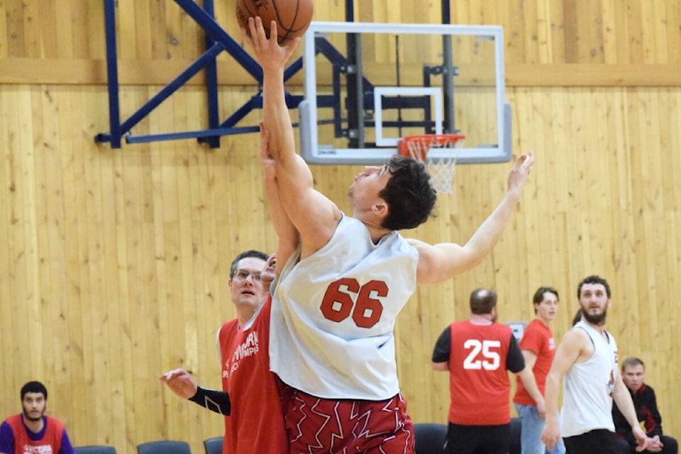 Brett Lehtonen of Port Alberni’s ‘B’ team sinks a basket during a game against Victoria Special Olympics. (ELENA RARDON / Alberni Valley News) 