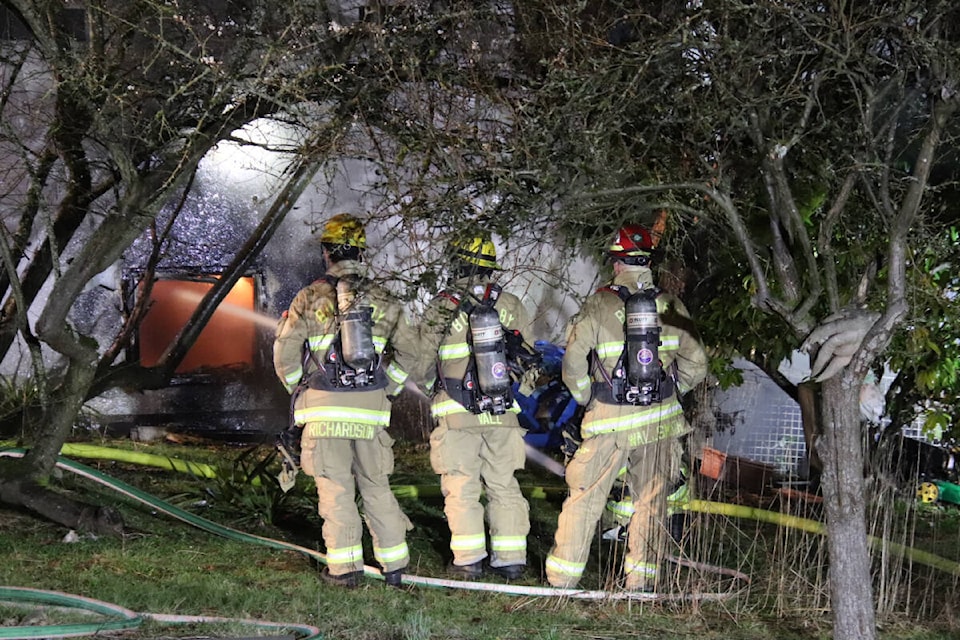 A single family home in the 3600-block of Douglas Road in Burnaby was seriously damaged on Wednesday morning (March 13) after a fire broke out around 5 a.m. (Credit: Shane MacKichan) 