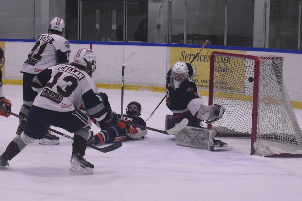 Ryley Callan scores the Comox Valley Glacier Kings’ first goal, beating Karry Park Islander goalie Ryder Gregga from the slot. Photo by Terry Farrell/Comox Valley Record 