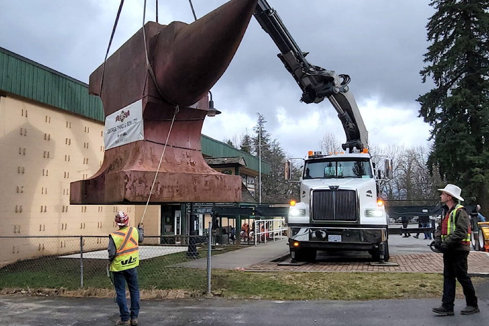 On Wednesday, March 13, George Third and Son employees delivered the anvil and carefully placed it outside the BC Farm Museum just beside the sign.(Kyler Emerson/Langley Advance Times) 