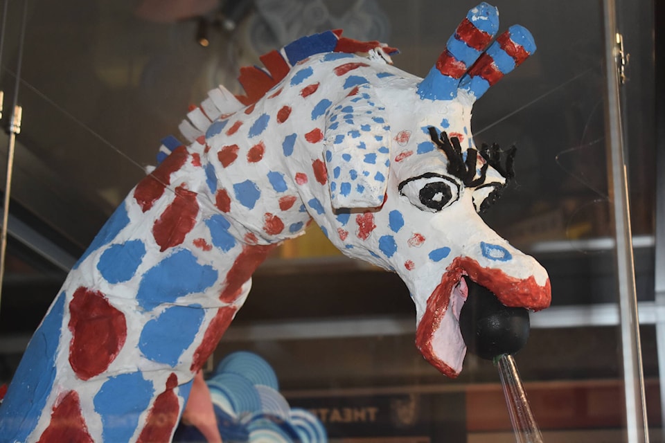 The original version of White Rock Players Club’s famous mascot, ‘Shenanigans the pantomime giraffe’ is front and centre in the current White Rock Museum and Archives show tracing the 80-year evolution of the community theatre group. (Alex Browne photo) 