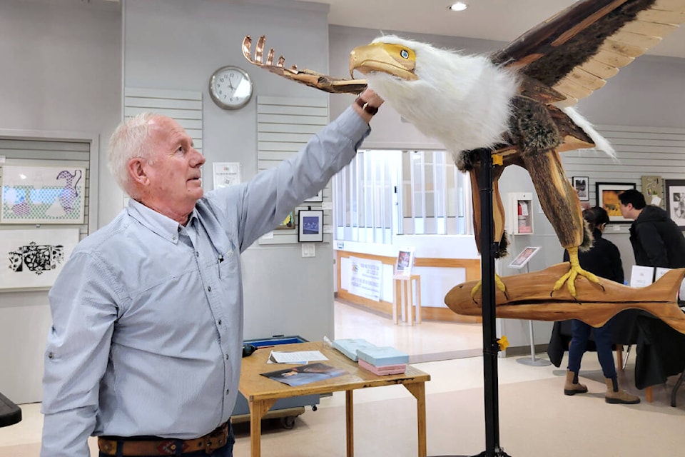  Ted Lightfoot gave a presentation about the unique role bald eagles play in the wetlands as part of the 91ԭ Arts Council’s month-long culture celebration on Saturday, March 16. (Kyler Emerson/91ԭ Advance Times)  