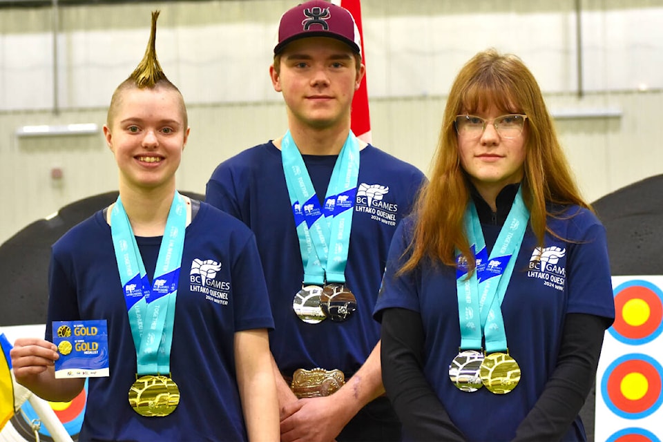 Quesnel River Archers Club placed three athletes on the podium - twice each - at the Lhtako Quesnel BC Winter Games: Lily Fraser (of 150 Mile House), Kayden D’Entremont and Kayla Erickson (L to R). (Frank Peebles photo - Quesnel Cariboo Observer) 