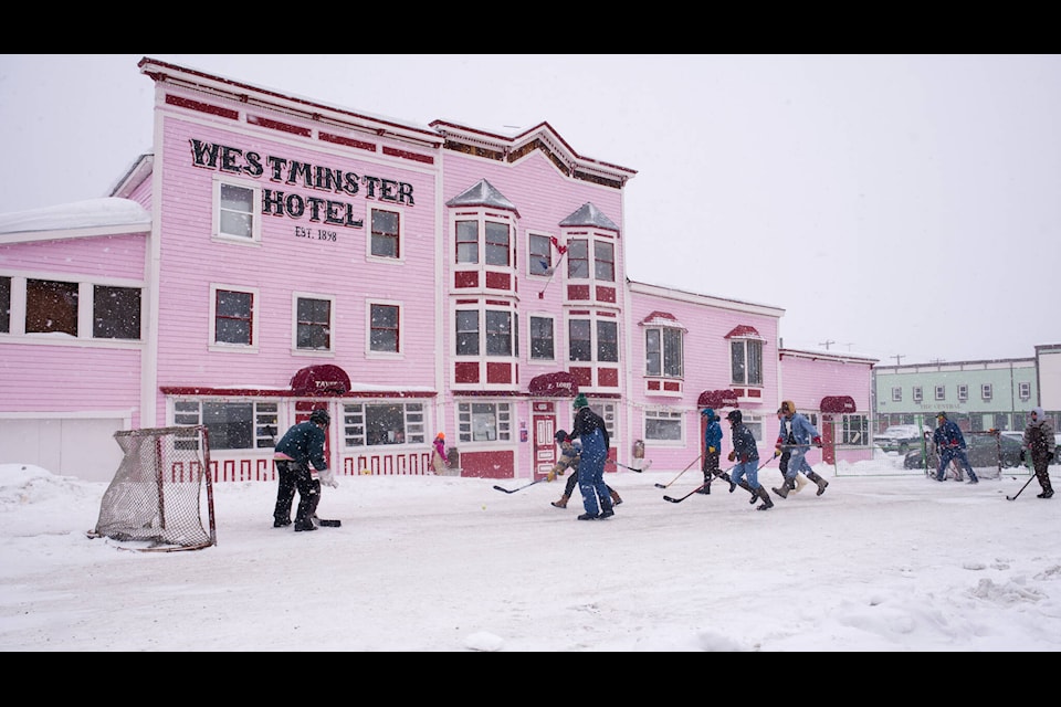 The street in front of the Westminster Hotel served as the ice for a road hockey tournament on March 16. (Jim Elliot/Yukon News) 