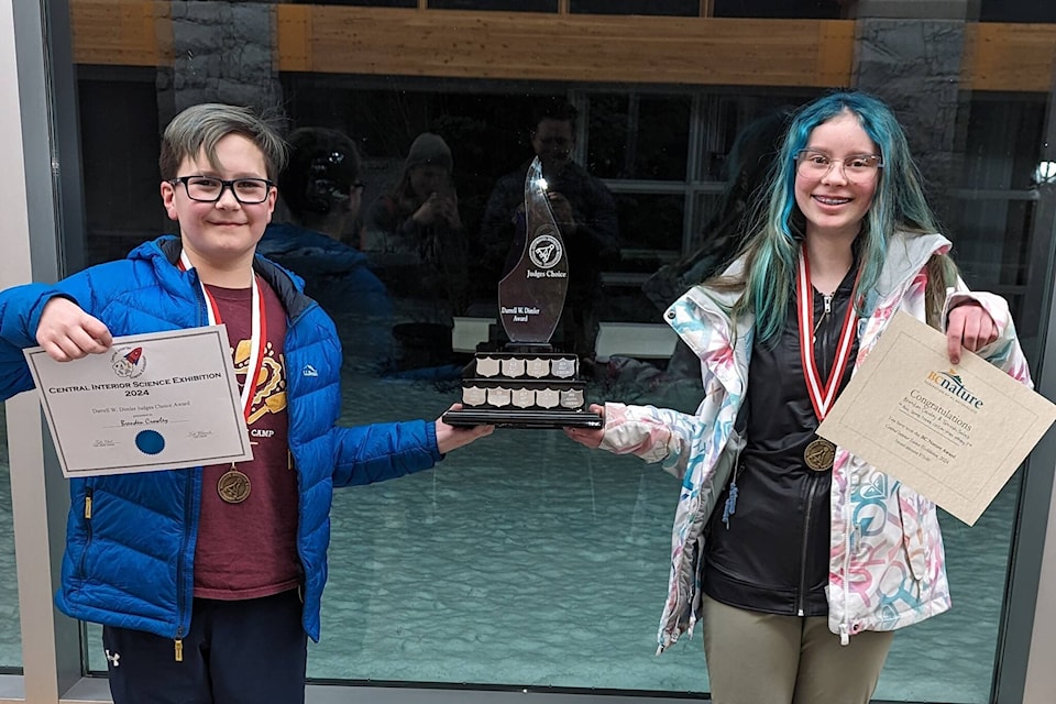 Brenden Crowley, left, with Tahira Soles pose with their awards in Prince George. (Submitted photo) 