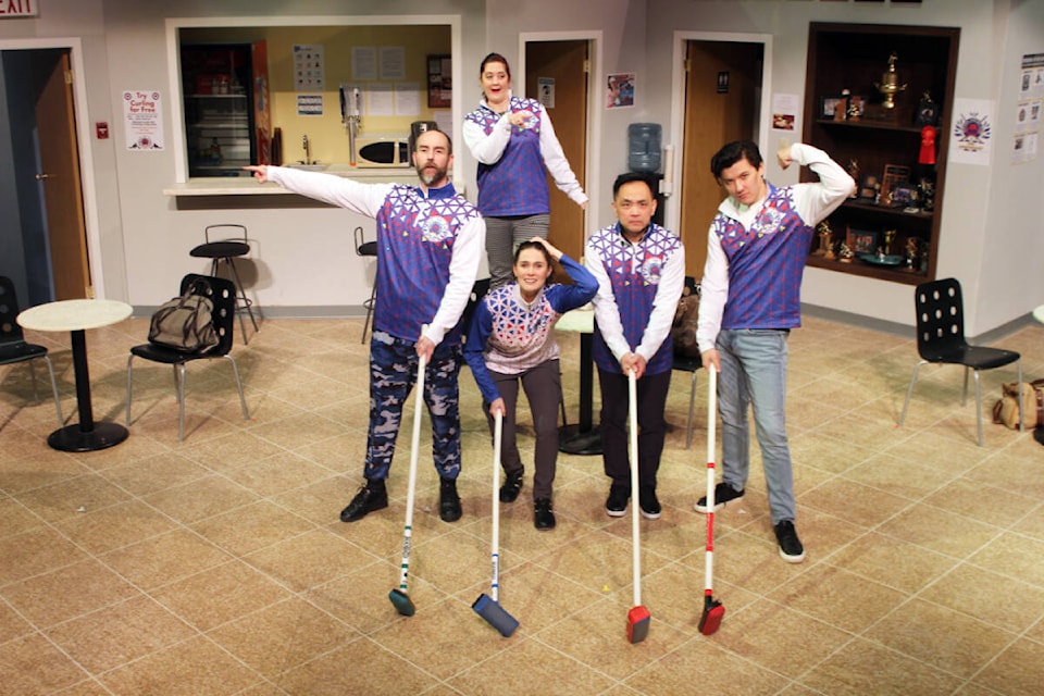 A series of curling directions are provided at the same time by the cast of Hurry Hard. Back: Naomi Costain. Front, from left: Sean Baker, Emma Rendell, Raugi Yu and Dylan Floyde. (Photo by Don Bodger) 
