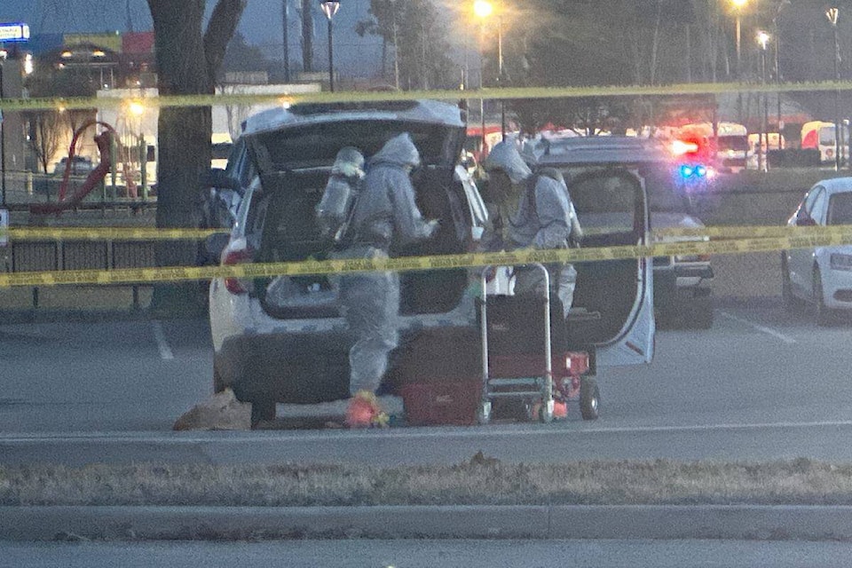 A hazmat team is on scene searching a Kelowna RCMP vehicle. (Brittany Webster/Capital News) 