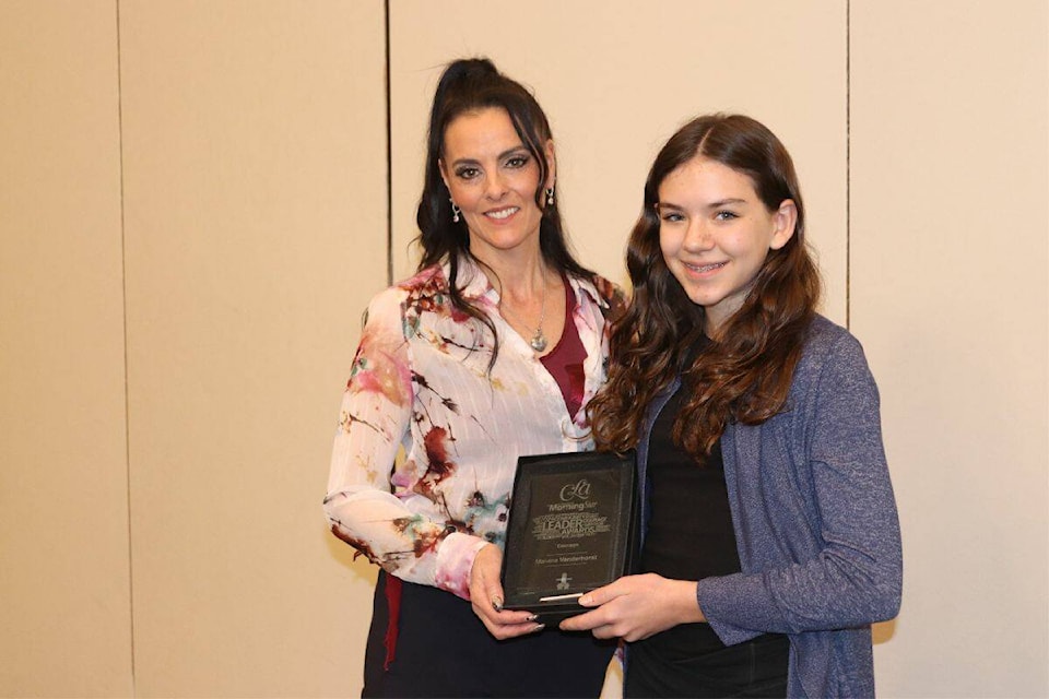 Makena Vanderhorst is presented with a plaque for Courage at the 2024 Community Leader Awards. (Bowen Assman- Morning Star photos) 