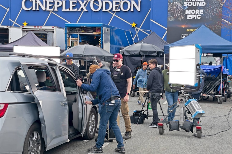 Production crews took over part of the Cineplex Odeon Meadowtown Cinemas parking lot on Wednesday, March 20, to film scenes for the upcoming Playdate movie. (Scott White - Shinobi Creative Productions/Special to The News) 