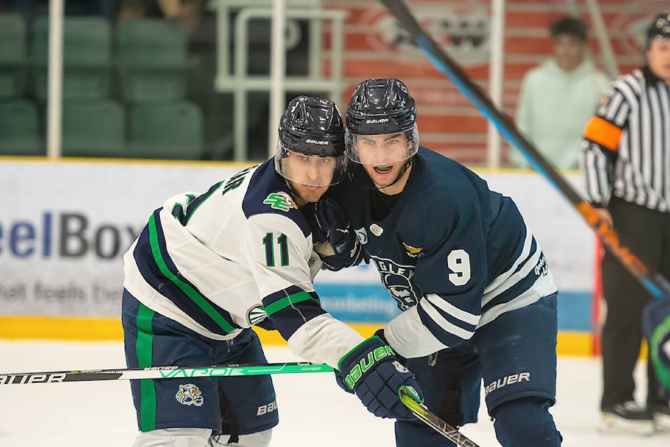 Rivermen No. 9 Grayden Daul and Eagles No. 11 Savek Brar jostled for position Sunday, March 24 at George Preston, in the Langley team’s last home game of the season. (Gilliam Kirby/Langley Rivermen/Special to Langley Advance Times) 