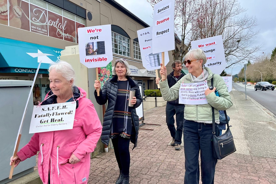 People protested at South Surrey-White Rock Kerry-Lynne Findlay’s office on Thursday (March 21) in the Tin Cup March for Fair Seniors Pensions, which happened across B.C. (Tricia Weel photo) 