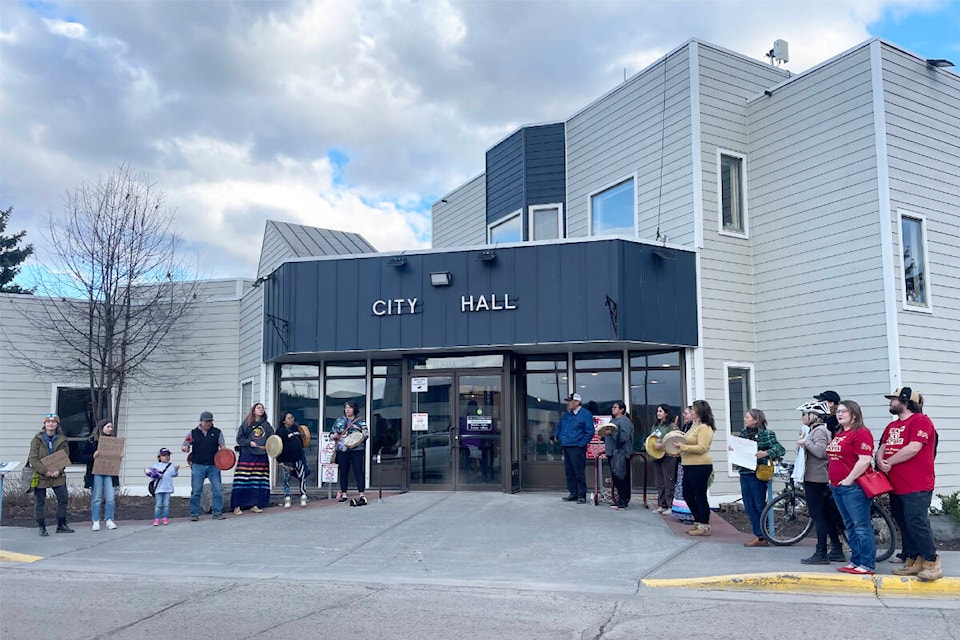 Community members gathered outside of Williams Lake city hall in advance of the March 26,2024 meeting as council prepared to make a difficult decision regarding a possible homeless shelter location in the downtown.  (Ruth Lloyd photo - Williams Lake Tribune) 