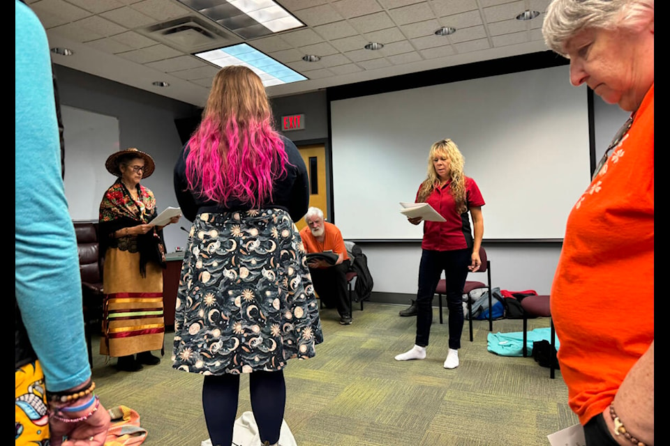 Dianne Garner (second right) facilitates a KAIROS blanket exercise in Hope on March 22, as part of a two-day Truth and Reconciliation event led by the Hope Inclusion Project. (Jessica Peters/Black Press Media) 