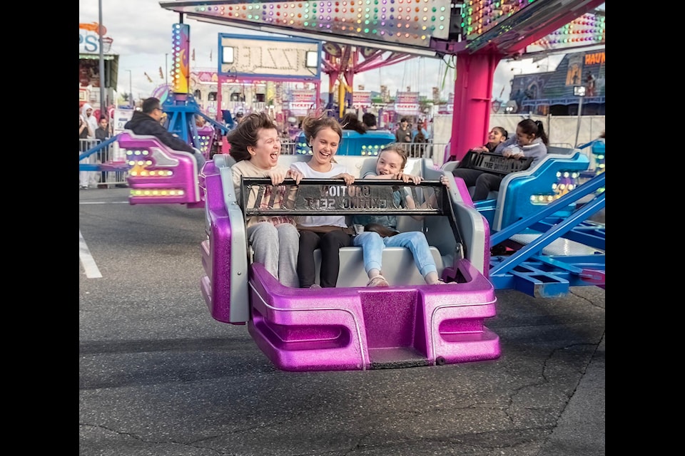 There are plenty of smiles and laughs at the Junction Shopping Centre as West Coast Amusements has set up a carnival, complete with rides and games. / Bob Friesen Photos 